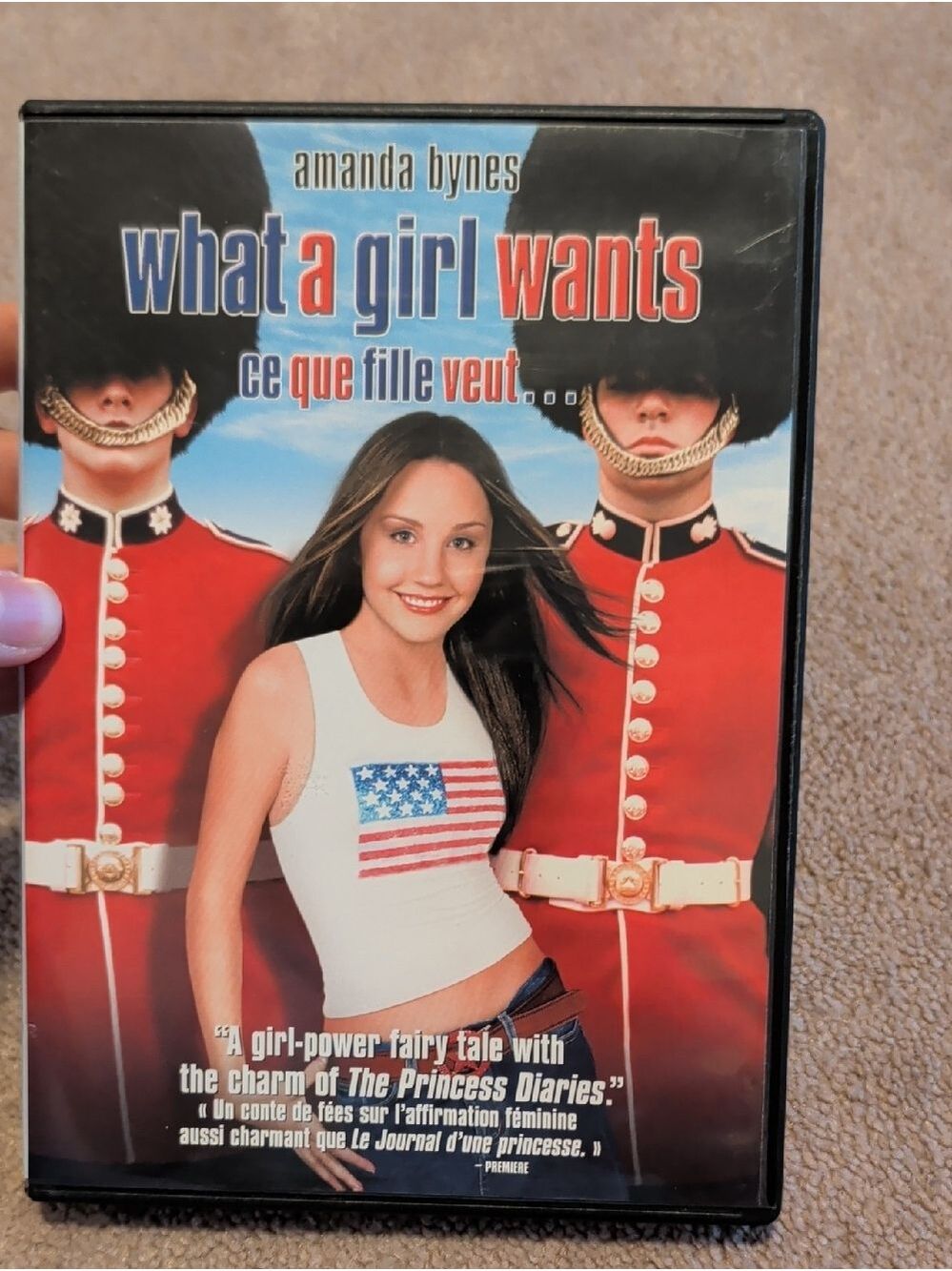 💜 5/$20 What a Girl Wants DVD - Amanda Bynes - White Tank Top with Flag